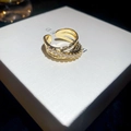 Detail of gold-plated crossover ring featuring micro-pave zircons and twisted texture - 34# Ring - Gold - Geometric