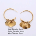 Golden hoop earrings with a textured sunburst pendant and metal beads design - Bead Pendant Decor (Style I)