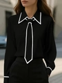 Detail of black long-sleeve shirt featuring minimalist white contrast line accents on collar - S / Tops / Black
