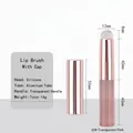 Portable silicone lip brush with rose gold tube and transparent pink handle in shade 03 - Pink Crystal Silicone Lip Brush with Lid