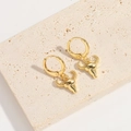 Exotic golden bull head pendant hoop earrings on a beige stone surface for women - Bull Head (ES2643牛头)