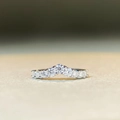 Macro detail of the silver S925 moissanite ring with elegant V-shaped curve and round diamonds - US 5 / V-Shape Pave Band-Silver