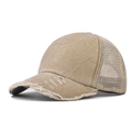 Close-up of distressed khaki washed cotton baseball cap with mesh trucker back detailing - Adjustable / Khaki