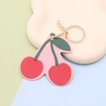 Cute cherry shaped faux leather keychain with golden ring and pink leather backing - Keychain style / Cherry