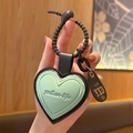 Light green heart-shaped leather keychain with black spring ring for bag decoration - Leather-Green Heart