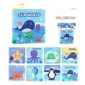 Sea World theme baby cloth book featuring whale and sea turtle illustrations with handle - Sea World Cloth Book
