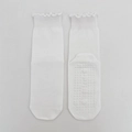 White anti-slip yoga socks with ruffled cuffs and silicone grips on the bottom - One Size / White