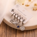 Detailed set of five stainless steel silver star and moon earrings on display card - Blue Star Moon Disc Set