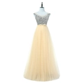 Detail of silver sequins on sleeveless bodice and champagne layered mesh evening gown - US size 2 (S) / Yellow