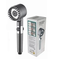 Grey turbocharged shower head with massage brush and one-key stop button near packaging - Single Shower Head (Color Box) / Gunmetal