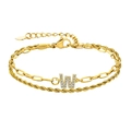 Bracelet double couche en or avec initiale W, chaîne trombone et maille torsadée - Lettre W