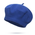 Classic bright blue wool beret for women in vintage French style on white background - Sapphire Blue