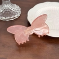 Rosafarbene Haarklammer in Schmetterlingsform aus glänzendem Acetat-Material - 8.5cm / Orangerosa