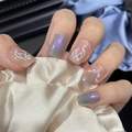 Detailed view of grey-purple chrome square nails with pearl accents on beige silk - By1694 Blue Mermaid / Glue Type