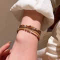 Multilayer beaded bracelet featuring green stones, brown beads, and gold accents - Brown/Multi-Layer Seed Beads