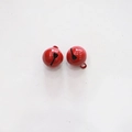 Close-up of two small 14mm vibrant red metal bells with a polished lacquer finish - Red