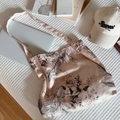 Pink linen tote bag with black floral patterns shown with a laptop on white bedding - Crossbody Style / Khaki Banana Leaf Crossbody