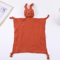Detail of soft cotton gauze baby security blanket with orange rabbit head and knots - 30*30 cm / Brick Red