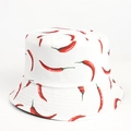 Close-up of white cotton bucket hat with vibrant red chili pepper pattern and fine stitching - White Chili