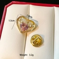 Detail view of heart-shaped gold brooch with pink crystal and deer antlers, 1.9cm x 1.5cm - C131-Pink Heart Antler