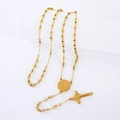 Golden stainless steel rosary necklace with beads and cross on a white display - Style 4