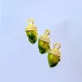 Detailed view of acorn charms with dimensions 1.3cm by 0.5cm and 2.1g weight - Yellow-green Nut