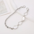 Detailweergave van de zilveren metalen telefoonketting met ovale massieve schakels - K1295 Ketting met vier onregelmatige elementen / Zilver