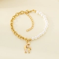 Detail of beaded pearl and gold titanium steel bracelet with a mother-child heart charm - Enamel Mother And Child Heart (KB203700-Z)