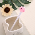 Cute pink pig cartoon gel pen with white barrel on creative desk setup with accessories - White Barrel Pig