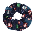 Close-up of navy blue Christmas scrunchie with festive Santa and snowman prints - Sapphire Blue