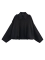 Detail of black suede oversized jacket with cape sleeves and elastic hem detail - Black