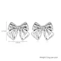 Elegant silver bow stud earrings with realistic ribbon fold detail in a shiny metallic finish - 3D Bow Silver