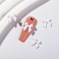 3D white resin bow and red butterfly charms on nude pink long press-on nails - White