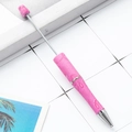 Pink creative beaded pen featuring a white ribbon pattern and polished silver metal accents - Pink Ribbon Retractable Pen (98)