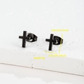 Detail view of mini black cross earrings with dimensions 0.8cm height and 0.5cm width - Cross / Black