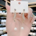 Elegant gold butterfly tassel earrings with shimmering crystals and white pearl drops - Gold Wavy Pearl Tassel Earrings (Silver Earring Post) E1309