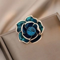Golden alloy rose brooch with deep green enamel petals and a sparkling blue rhinestone - 313# Blue Camellia