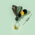 Interactive bee cat toy attachment with yellow plush body, green feathers and golden bell - No. 6 Insect Replacement Head