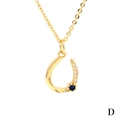 Elegant gold U-shaped horseshoe necklace with blue gemstone and white zircon stones - Blue and White Zirconia