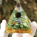Green crystal pyramid with silver spiral symbol and gold foil on clear resin base - Tea Ball 3-Spiral / Small