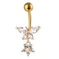 Piercing de ombligo dorado con mariposa, flor y circonitas brillantes sobre fondo blanco - Dorado