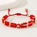 Double-layered red beaded evil eye bracelet with adjustable hand-woven red cord - Double Layer Red Bead Eye (C-B23073101A)