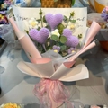Handmade crochet flower bouquet with purple hearts and white daisies in pink gift wrapping - Purple Heart