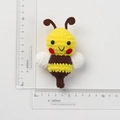 Handmade knitted bee keychain doll in yellow and brown yarn, height approx 9.5cm - Blush Bee Pendant