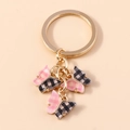 Pink and black checkered butterfly keychain with golden metal ring and charms - Pink Black Plaid (YZ172fenhei)