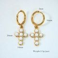 Detail view of gold hoop earrings with pearl-set cross pendant and size specifications - Gold Pearl Cross