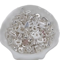 Bulk silver metallic 26 alphabet letter charms for DIY jewelry making in a white shell bowl - Silver Mixed Color Perforated Letters Real Silver Plated