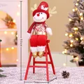 50cm plush Christmas reindeer figurine sitting on a red ladder for holiday decoration - Reindeer (Red Ladder)