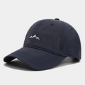 Detailed close-up of mountain peak embroidery on a navy blue quick-dry baseball cap - Adjustable / Navy Blue