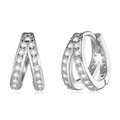 Detailed macro view of silver geometric earrings with sparkling zircon stones - Platinum 3-Stone / White Gold